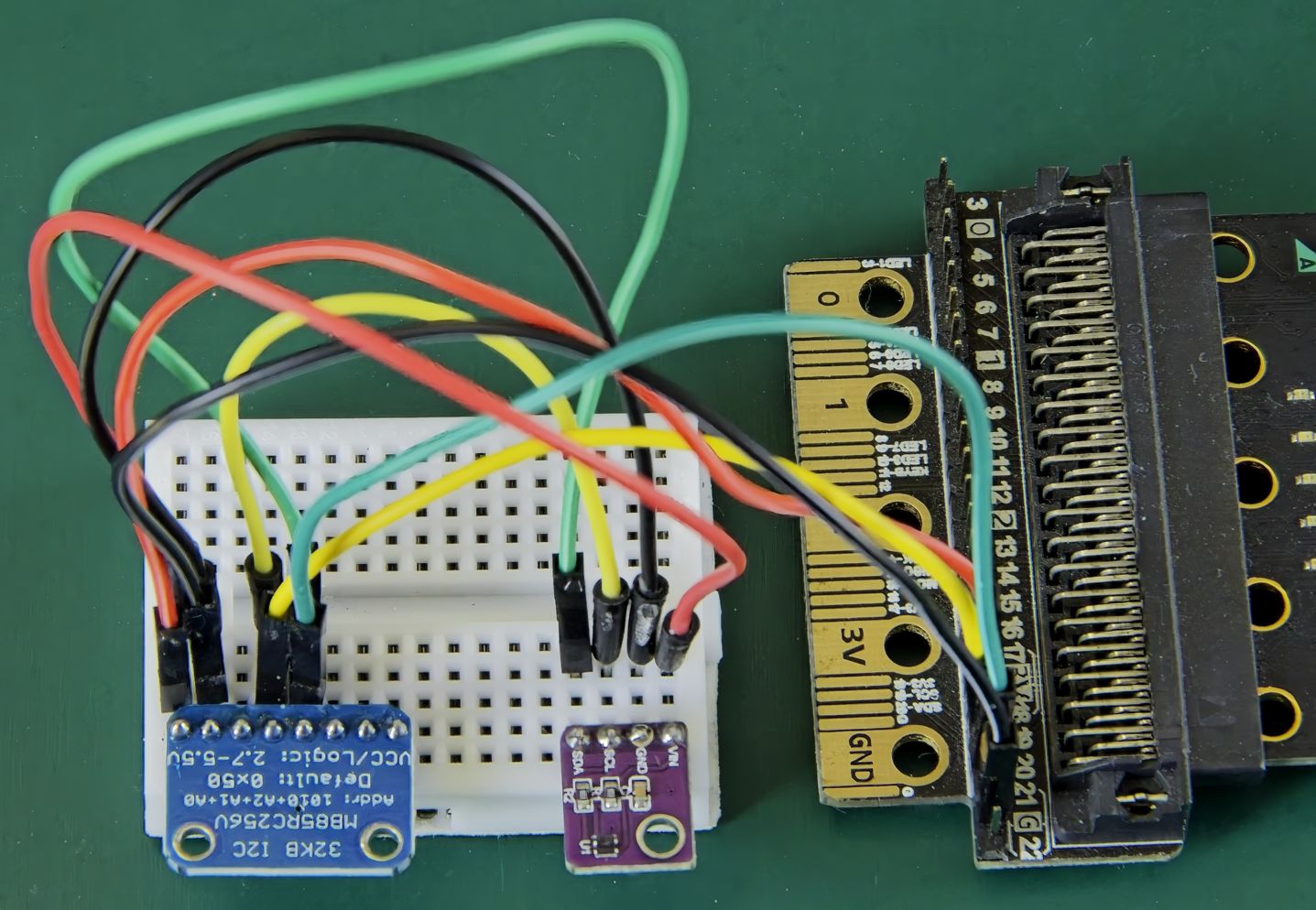 SHT40 sensor and MB85RC256V FRAM memory breakout boards attached to micro:bit