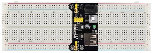 The MB102 power module attaches securely to a breadboard with pins that plug into the power rails of the breadboard.